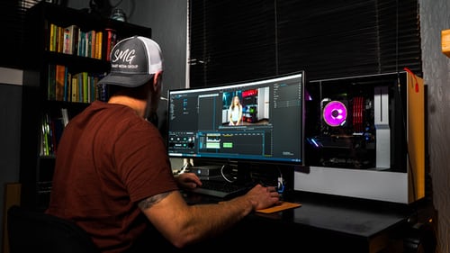 Picture of a video editor at work. In a post about gifts for video editors