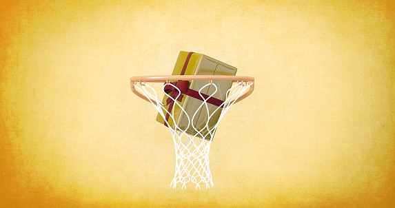 Basketball hoop with gift box on yellow background | gifts for basketball lovers