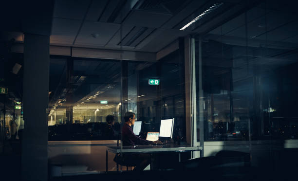 Shot of a businessman working late in an office _gifts for someone who works night shift