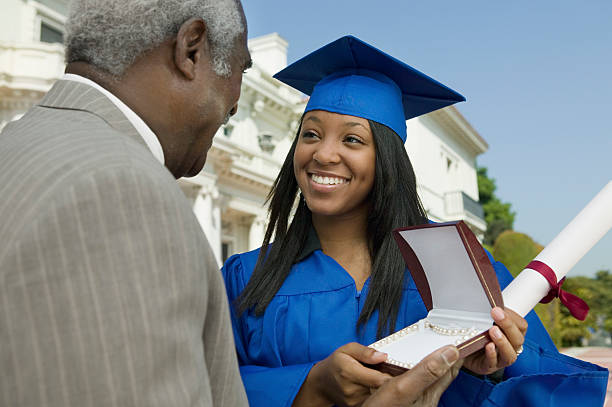 Father Giving Daughter Graduation Gift _graduation gift for daughter from dad