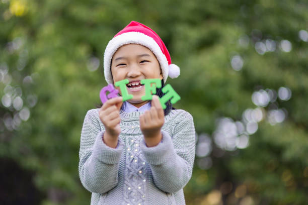 Chinese Christmas Girl Holding "GIFT" - chinese christmas gift ideas