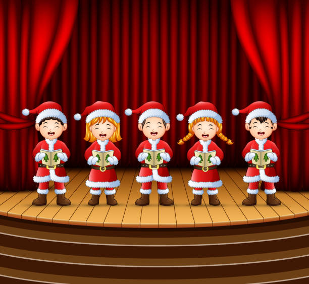 Group of children singing christmas carols on the stage - gifts for theater students