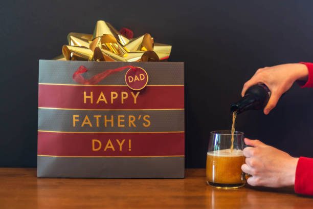 Celebrating Father’s Day with a present and cold beer for Dad - alcohol Father’s Day gifts