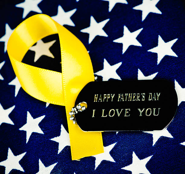 Military dog tag with a message for dad on top of an American flag - navy Father's Day gifts
