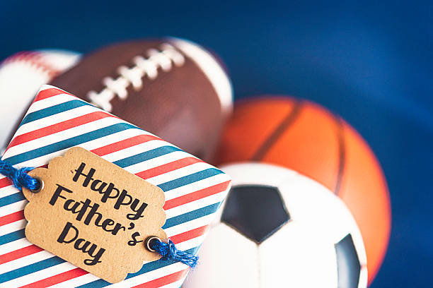 A picture of footballs, soccer, basket ball etc celebrating Father's Day - nfl Father's Day gifts