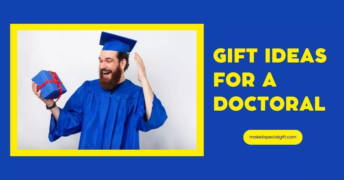 Amazed student man in blue bachelor holding gift box. - gift ideas for a doctoral graduate